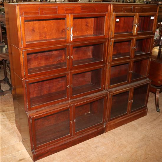 2 mahogany bookcases each with 8 glazed doors